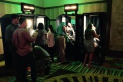 This is a picture of four of our event photo booth rentals in action. You can see the smiles and the fun everyone is having in our classic photo booths.