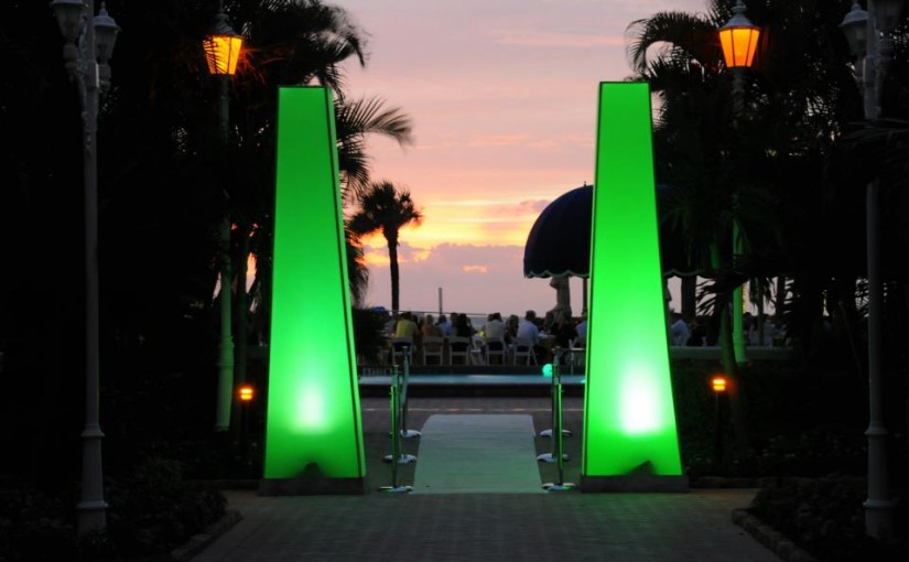 Green Spandex Truss Towers for your next event decor lighting rental in Orlando, Miami, Las Vegas