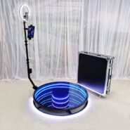 Infinity Mirror LED 360 Photo booth that is available for rent. The 360 photo booth comes complete with revolving camera, and LED lights making it a fun addition to any party. 