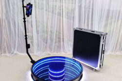Infinity Mirror LED 360 Photo booth that is available for rent. The 360 photo booth comes complete with revolving camera, and LED lights making it a fun addition to any party.